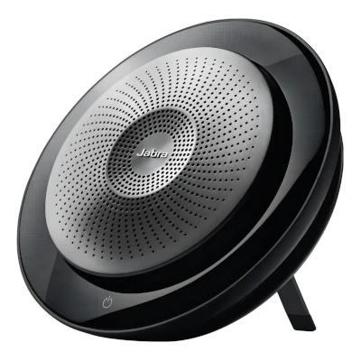 Speakerphone Jabra Speak 710 sobre mesa de home office durante reunião
